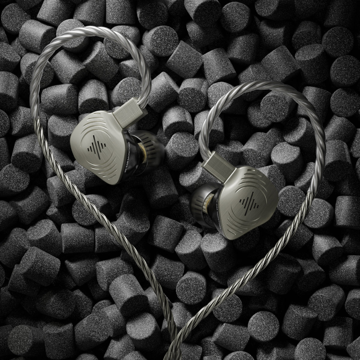 Close-up of Soundbrenner Wave Pro 2 earphones and their detachable cable